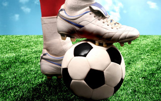 Person soccerball grass sky clouds - free sports wallpaper for desktop
