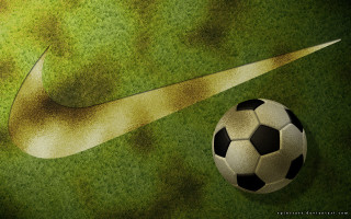 Soccer ball nike logo green - a green field of grass free wallpaper for desktop