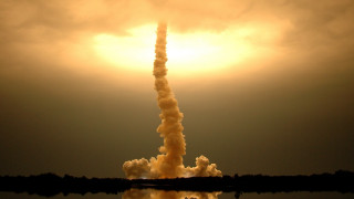 Rocket flying smoke sky sun - a rocket free wallpaper