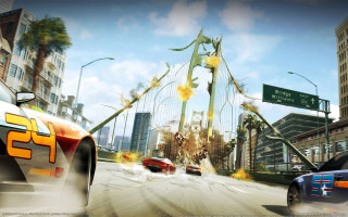 Car driving street tall building - a giant spider free wallpaper