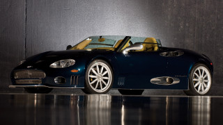 Blue sports car yellow top 2 - a studio setting free wallpaper
