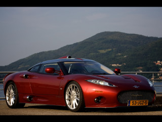 Red sports car road water 3 - single free wallpaper