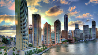 City skyline river sunset clouds - a sunset in the background free wallpaper for desktop
