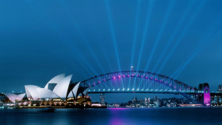 Large bridge water opera city - side and a city in the background free wallpaper