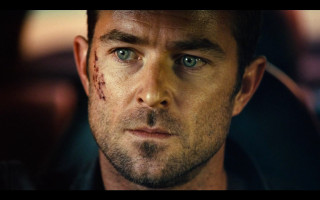 Bruised man black jacket serious - perfect eye free wallpaper