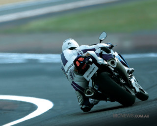 Person motorcycle race track helmet - dynamic free wallpaper