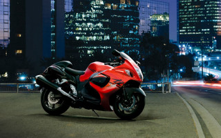 Red motorcycle parked road city - a city skyline free wallpaper