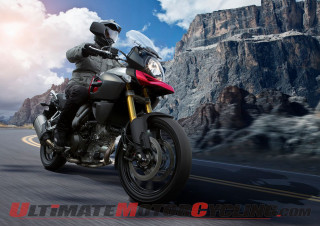 Man riding motorcycle mountain range - cloud and sun free wallpaper