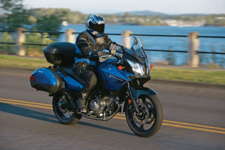 Man riding blue motorcycle lake - a street next free wallpaper