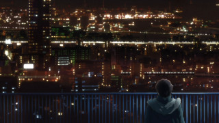 Person sitting bench city lights - a city skyline in the background free wallpaper