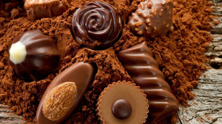 Chocolates dirt wooden table candle 3 - decadent free wallpaper for desktop