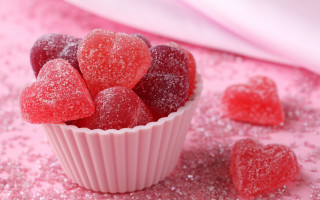 Sugared hearts pink background sugar - scattered free wallpaper
