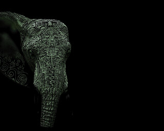 Elephant pattern trunk dark night - an elephant free wallpaper