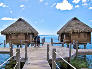 Couple people dock huts thatched - a dock next free wallpaper