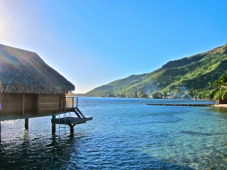Dock thatched roof mountain water - panoramic free wallpaper