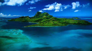 Small island water clouds plane - a small island free wallpaper for desktop