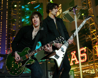 Two men playing guitars on 6 - guitar free wallpaper