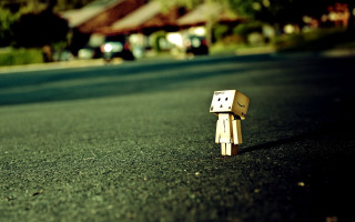 Small wooden toy road building - the side of a road free wallpaper