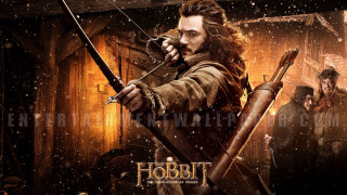 Man holding bow arrow snowy - ed benedict free wallpaper