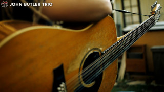 Guitar closeup person hand camera - a close up of a guitar free wallpaper