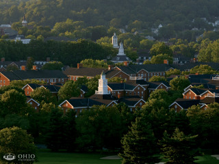 Town clock tower trees hills - a town free wallpaper
