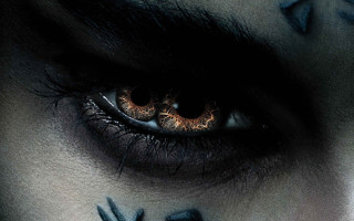 Close up eye cross painted - a close up of a persons eye free wallpaper for desktop