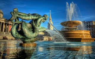 Fountain mermaid statue building spire - a fountain free wallpaper for desktop