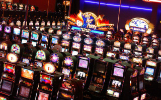 Neon slot machines cityscape ferris - a large room free wallpaper for desktop