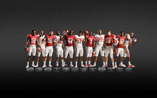 Football players standing line helmets - a line free wallpaper