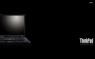 Laptop black surface black background - thin free wallpaper