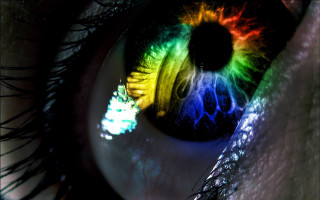 Rainbow iris macro fire planet - a close up of a persons eye free wallpaper