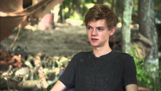 Young man forest chair bokeh - a young man free wallpaper