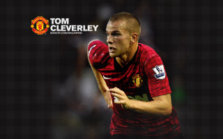 Man soccerball redshirt checkered floor - a soccer ball free wallpaper