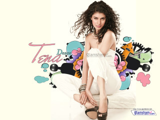 Woman white dress sitting bed 10 - a colorful background behind her free wallpaper