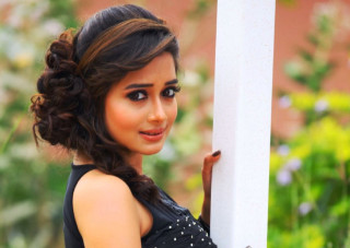 Woman smiling black dress flower - leaning free wallpaper for desktop