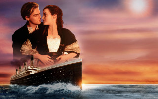 Man woman kissing boat ocean - sunrise time free wallpaper