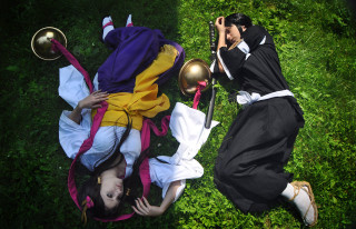 Couple laying lush green field 2 - cosplay free wallpaper for desktop