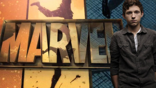 Man standing wolverine logo sign - afrofuturism free wallpaper for desktop