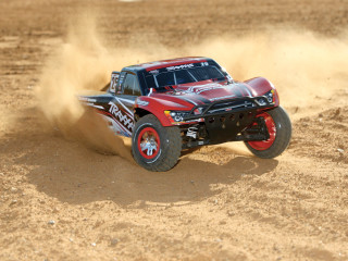 Red truck driving dirt sand - the tire free wallpaper