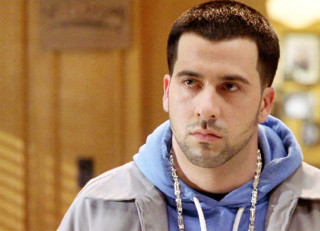 Man necklace serious look camera - young free wallpaper for desktop