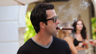 Man smoking cigarette woman behind - a man smoking free wallpaper