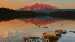 Mountain range reflection lake sunset 12 - a still lake free wallpaper