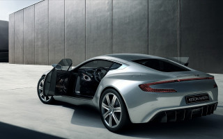 Silver sports car parked building 2 - its door free wallpaper