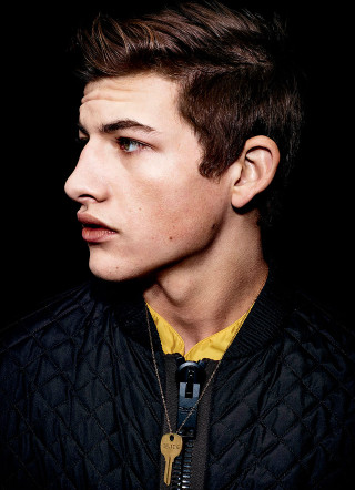 Man black jacket yellow shirt - free portrait wallpaper