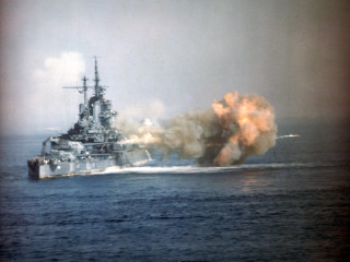 Battleship smoke small boat water - a smaller boat free wallpaper