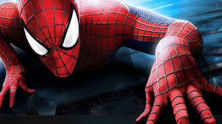 Spider man laying city background - a spider man free wallpaper
