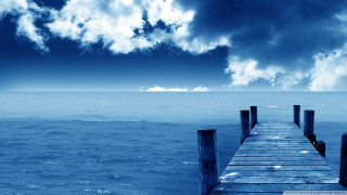 Pier ocean cloudy sky boat 3 - the ocean under a cloudy sky free wallpaper