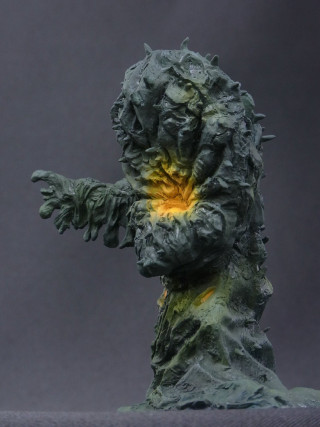 Sculpture man yellow light face - a gray backdrop free wallpaper