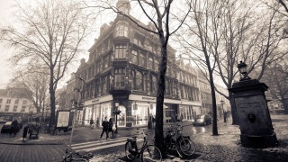 Black white building bicycles people - photo of a building free wallpaper