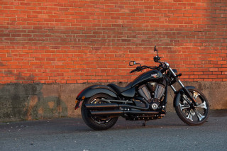 Black motorcycle brick wall building 3 - brenda chamberlain free wallpaper